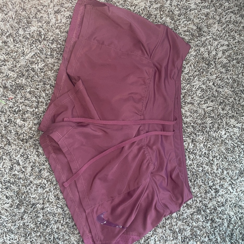Nike magenta running shorts, 3”
